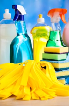 Assorted cleaning products, home work colorful theme