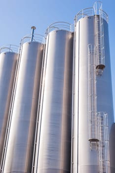 Detail of chemical plant, silos and pipes