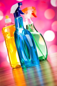 Assorted cleaning products, home work colorful theme