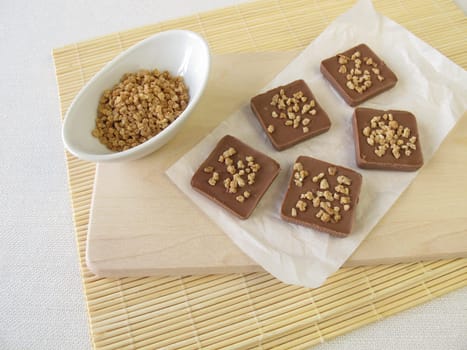 Homemade chocolate with almond croquette