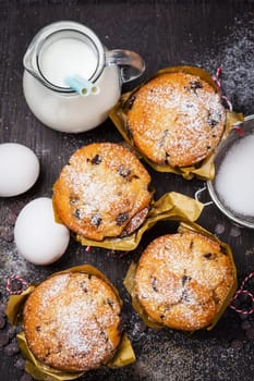 Homemade muffins with baking ingredients
