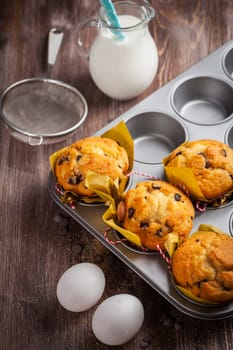 Homemade muffins with baking ingredients