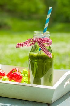 Green smoothie in a water bottle
