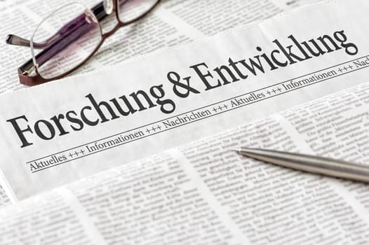 Newspaper headlined Research and Development