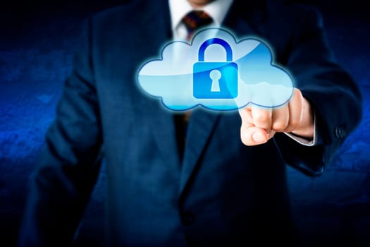 Upper body of a business man reaching out to touch a locked cloud computing icon. Metaphor for information security and protection in cyber space. Corporate suit and blue wall in background. Close up.