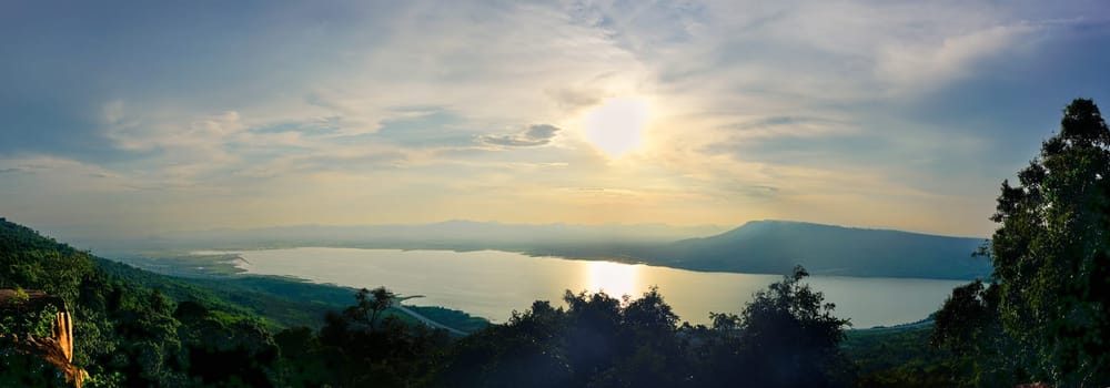 Panorama sunset with sky and lake behide in everning time