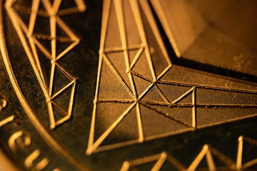 top view extreme macro closeup of crypto ethereum golden coin geometric symbol logo