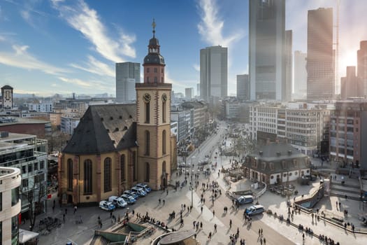 Frankfurt Downtown near Hauptwache with Katharinenkirche, Skyline in Background during sunset