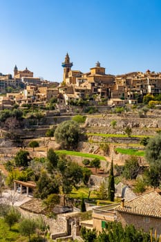 A beautiful view of the stairs and the buildings in Valldemossa, Mallorca Spain on a sunny day