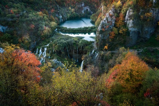 Majestic view on turquoise water and sunny beams. Picturesque and gorgeous scene. Popular tourist attraction. Location famous resort Plitvice Lakes National Park, Croatia, Europe. Beauty world.