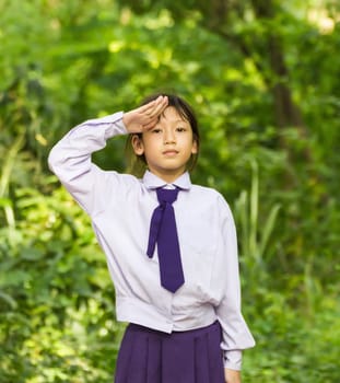 Asian girl student relaxing  in the park