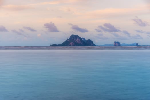 Beach sunset or sunrise with colorful of cloud sky and sunlight in evening light