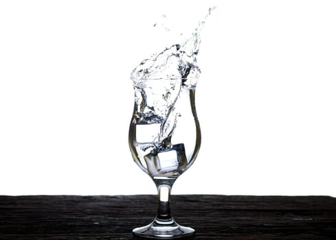 The image of pouring drinking water, into a glass, that makes one feel refreshed isolated on white background, Splashing water, Sparkling water