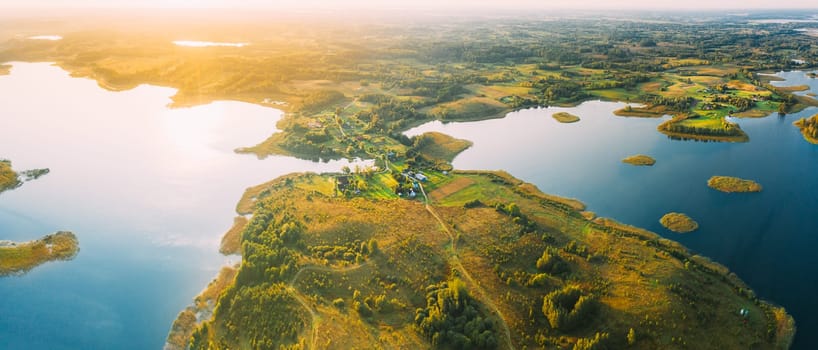 Braslaw Or Braslau, Vitebsk Voblast, Belarus. Aerial View Of Peninsula Maskovichi Nedrava Lake. Forest Landscape In Sunny Autumn Morning. Top View Of Beautiful European Nature From High Attitude. Bird's Eye View. Panorama. Famous Lakes. Natural Landmarks.