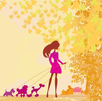 Girl walking with her dog in autumn landscape.