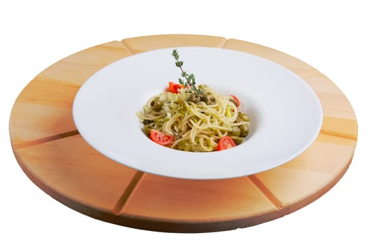 Traditional lenten spaghetti with shallot, tomato, rosemary and olives on a plate.