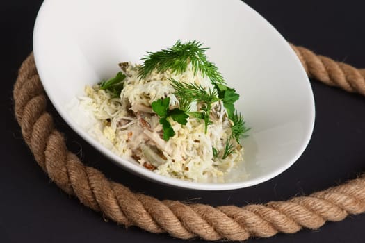 Salad with egg, mushroom, cheese and mayonnaise