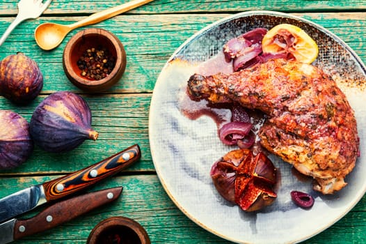 Appetizing chicken thigh roasted with autumn figs