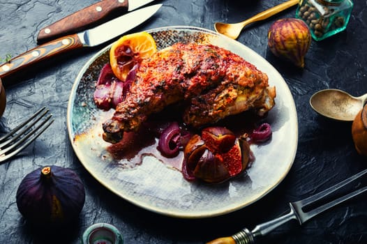 Appetizing chicken thigh roasted with autumn figs