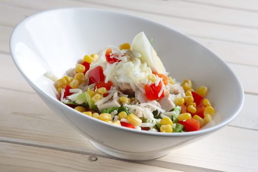 Salad with corn, egg, pepper, cheese