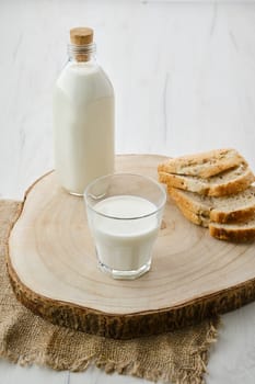 Bottle and a glass of fresh milk