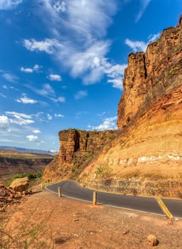 Asphalt road to the bridge across mountain river Blue Nile near Bahir Dar, Ethiopia. Africa