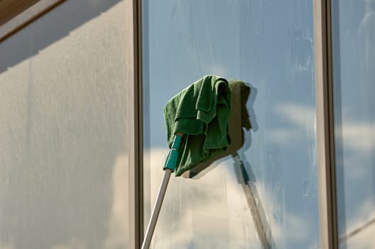 window washing, washing a street shop window. High quality photo