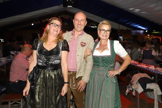 Claudia Schulz,  DJ Robert Laube and Stefanie Salzinger,.Barrel tapping Wandsbek Oktoberfest Hamburg with VIP Guest  ,16.09.2022
