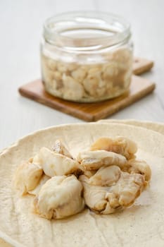 Closeup view of canned mackerel on a plate