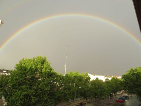 beautiful rainbow colors rain immense sky large red blue yellow