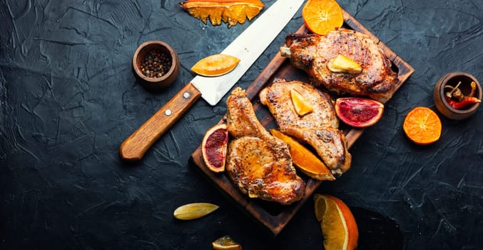 Meat steak, pork, cutlet on the bone fried in a citrus marinade.