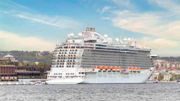 Istanbul, Turkey - August 25, 2022: Regal Princess, Huge cruise ship docked at terminal of Galataport, a mixed use development located along shore of Bosphorus strait, in Karakoy neighbourhood