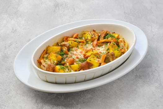 Hot casserole with honey agarics, pumpkin and potatoes