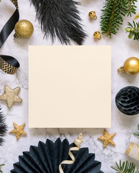 Square Paper card between black and golden Christmas decorations and fir tree branches top view. Winter composition with blank invitation card Mockup, copy space