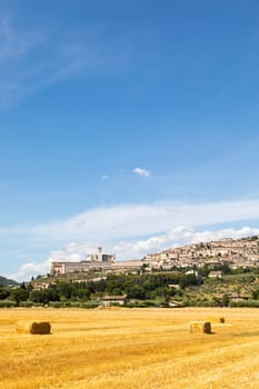 Assisi village in Umbria region, Italy. The town is famous for the most important Italian St. Francis Basilica (Basilica di San Francesco)