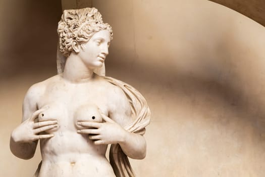 Florence, Italy - circa July 2021. Sensual naked woman statue. Beauty figure made of stone.