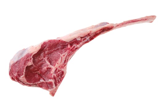 Overhead view of raw beef cowboy steak, bone in rib steak isolated on white background