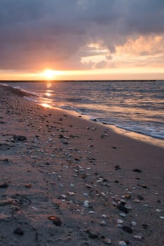 Sunset on the Baltic Sea. Sea, bean strong colors. Vacation on the beach. Romantic mood on the darss. Landscape photo.