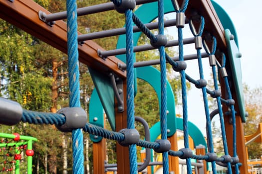 Children's playground with sports equipment in the city park. The concept of a healthy lifestyle.