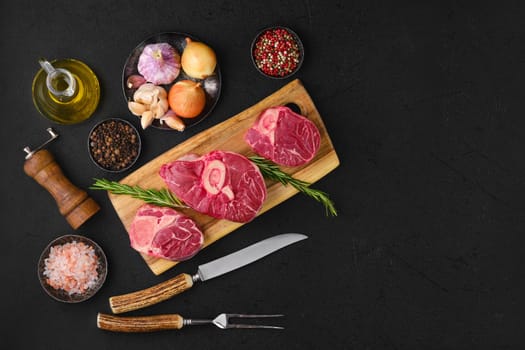 Overhead view of raw beef shank cross cut, ossobuco ready for cooking