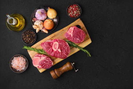 Overhead view of raw beef shank cross cut, ossobuco ready for cooking