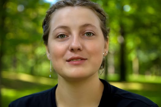 girl portrait young woman adult teenager student at the park smiling close-up
