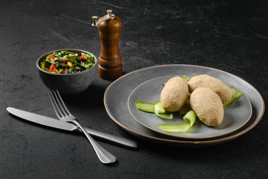 Semifinished frozen cepelinai. Potato dumplings stuffed with ground meat.