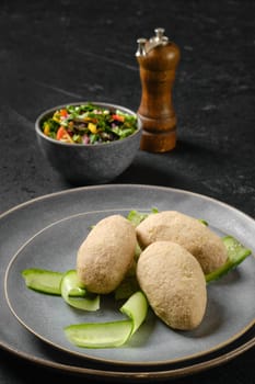 Semifinished frozen cepelinai. Potato dumplings stuffed with ground meat.