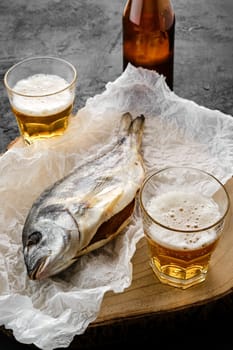Whole jerky dorado and a beer