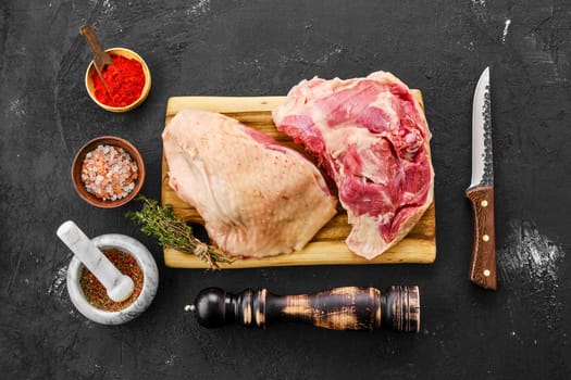 Top view of raw fresh turkey thigh with spices