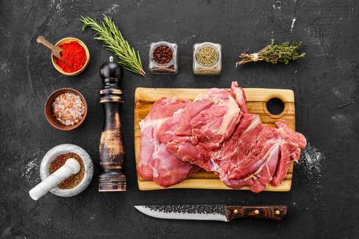 Top view of raw fresh boneless turkey thigh with spices