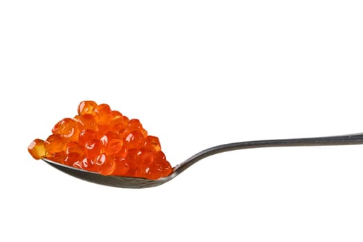 Spoon with salmon red caviar.