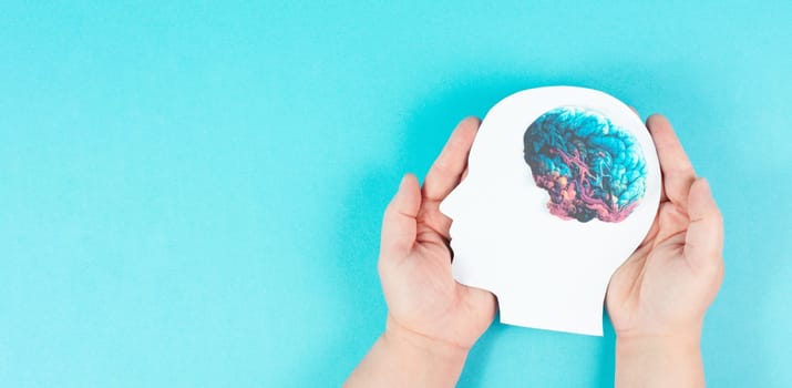 Holding a head with a brain in the hands, Parkinson disease, Alzheimer awardness, mental disorder dementia, psychology problems, cerebral vein thrombosis