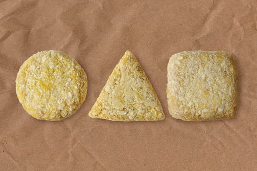 Round, triangular and square squid cutlet
